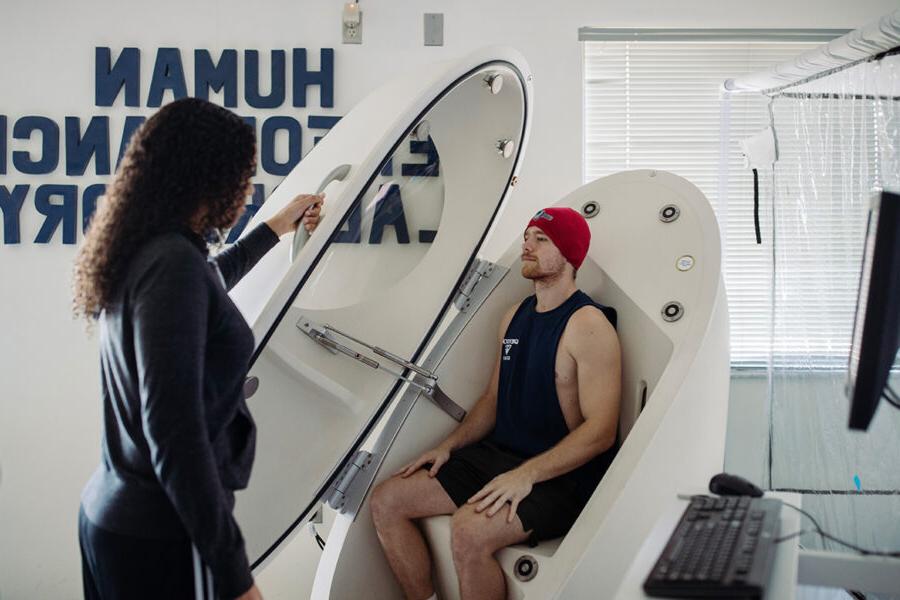 Exercise science student conducts a laboratory test.